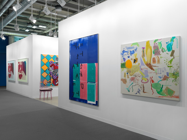 installation view of paintings and sculptures by various artists