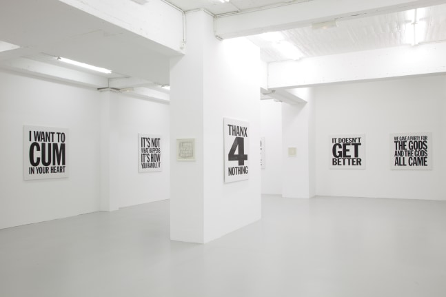 Installation view of wall works by John Giorno