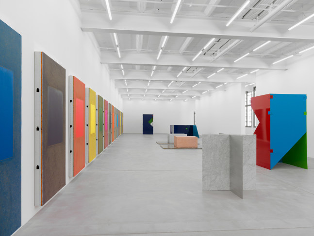 Installation view of Sam Falls paintings and sculptures exhibition