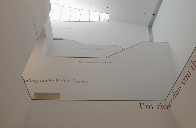 Installation view of wall works by Douglas Gordon