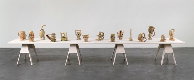 Group of sculptures by Andrew Lord on table