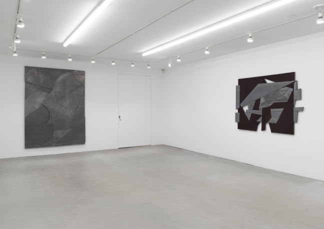 Installation view of Wyatt Kahn wall reliefs and works on paper
