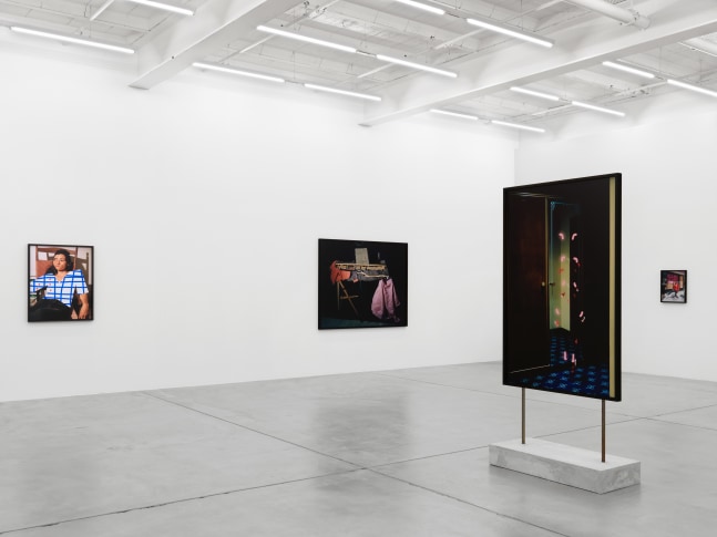 Installation view of Lucas Blalock photography and sculpture exhibition