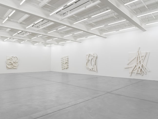 Installation view of Wyatt Kahn wall reliefs