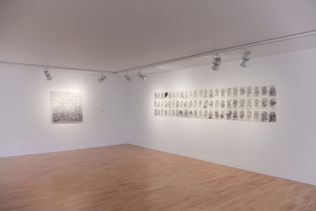 Installation view of works by Tim Rollins and K.O.S.