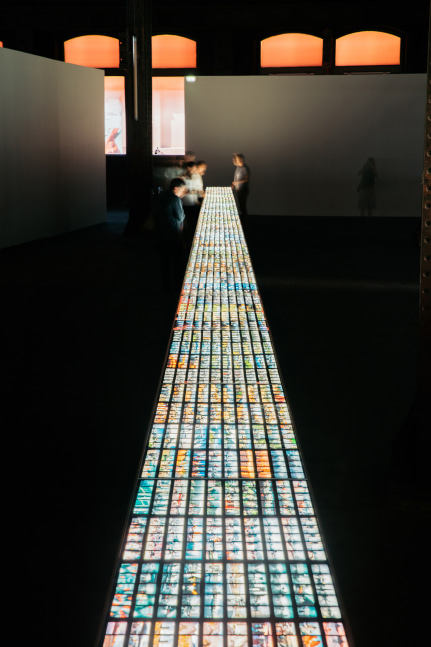 Installation view of images by Peter Fischli David Weiss