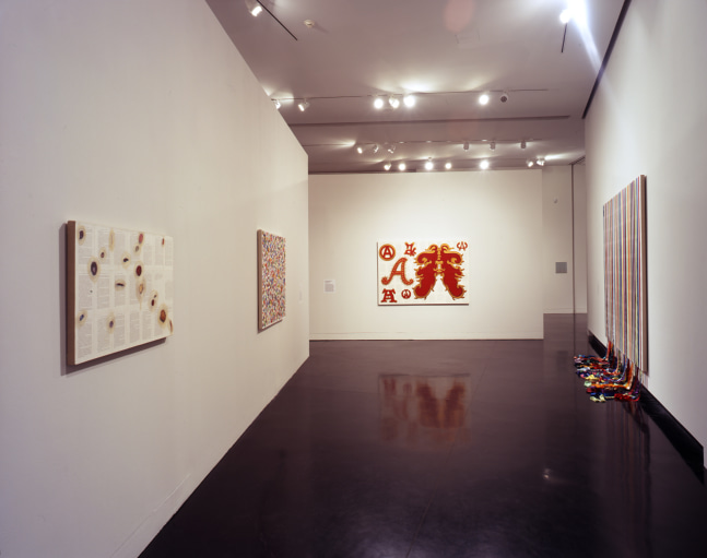 Installation view of paintings by Tim Rollins and K.O.S.