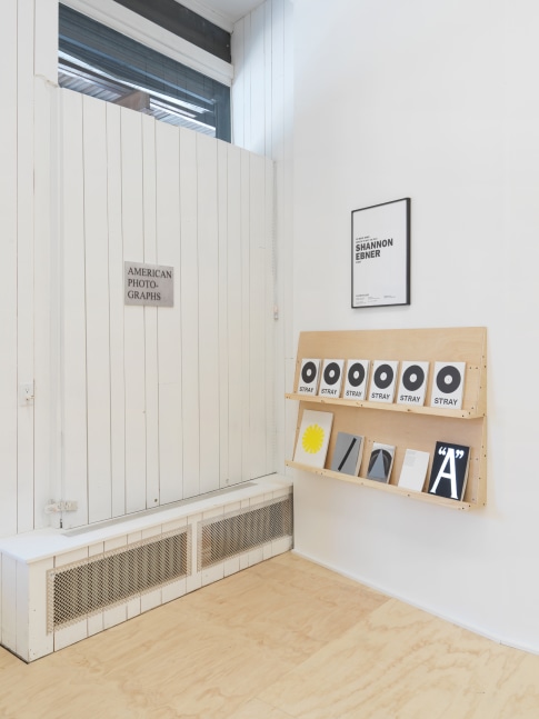 Installation view of photographs by Shannon Ebner