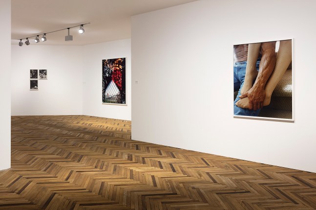 Installation view of photographs by Torbjørn Rødland