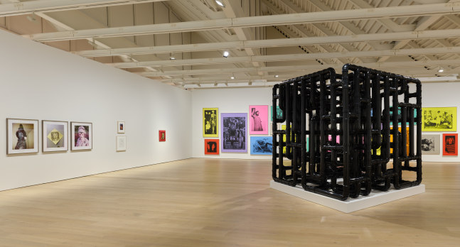 Installation view of sculptures, screen prints, paintings and drawings by Steven Shearer