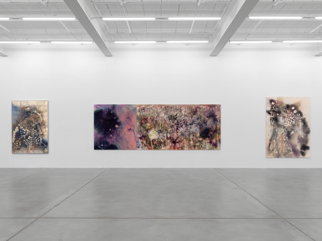 Installation view of Sam Falls paintings and ceramic reliefs exhibition