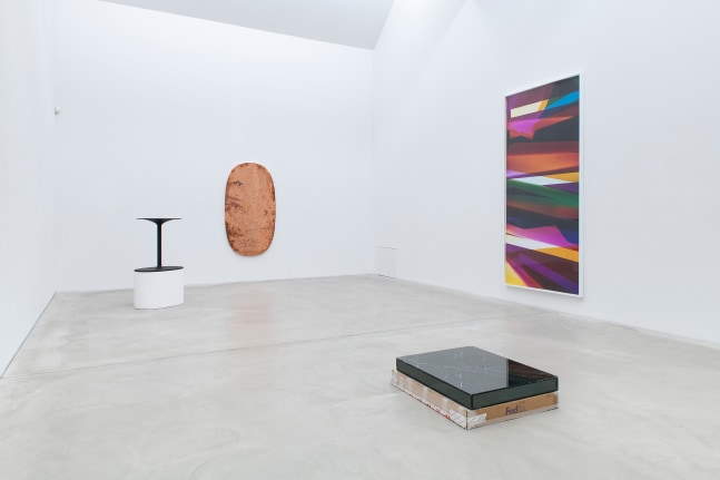 Installation view of sculptures and wall works by Walead Beshty