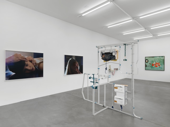 Installation view of group painting, photography, and sculpture exhibition