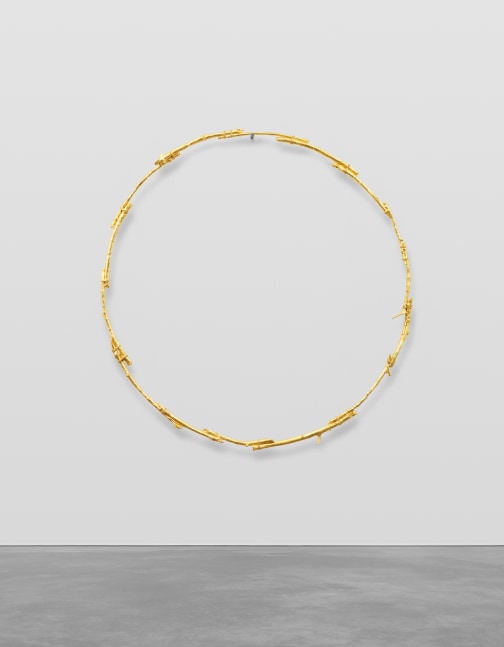golden bronze circle by Ugo Rondinone