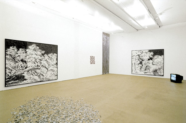 Installation view of sculptures and paintings by Ugo Rondinone