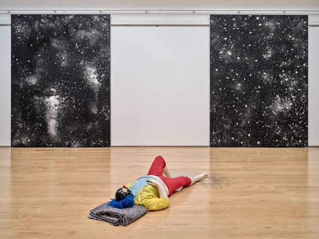 Installation view of paintings and sculptures by Ugo Rondinone