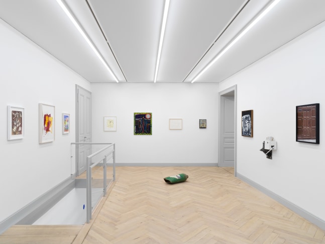 Installation view of group painting, photography, and sculpture exhibition