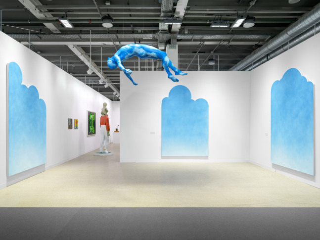 installation view of paintings and sculptures by various artists