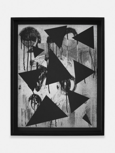 black and white collage of triangle and round shapes on paper