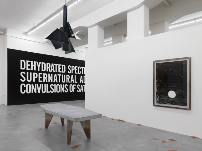 Installation view of paintings and sculptures group exhibition