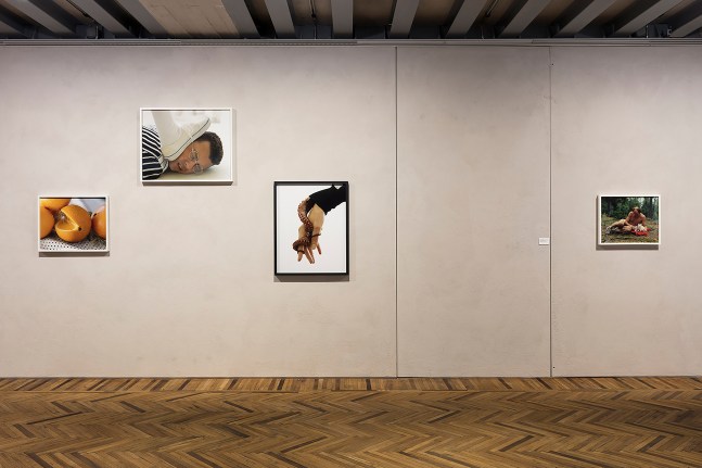 Installation view of photographs by Torbjørn Rødland