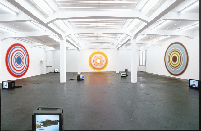 Installation view of paintings and sculptures by Ugo Rondinone