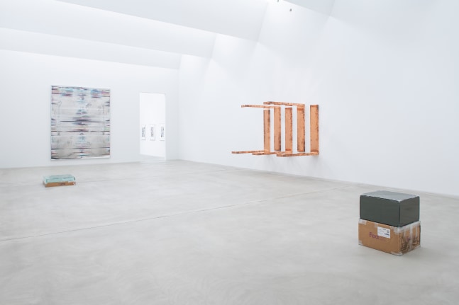 Installation view of sculptures and wall works by Walead Beshty