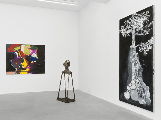 Installation view of group painting, print, and sculpture exhibition