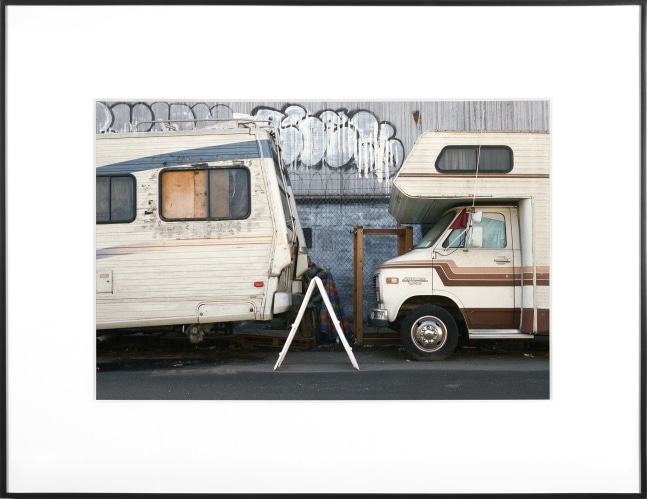 (Temporary) Homes for America: 3300 block to 4400 block, Union Pacific Avenue, between South Grande Vista Avenue and South Marianna Avenue, Los Angeles/Commerce, California, December 2020
2021
Chromogenic print
Ed. 1/1 + 1 AP
Sheet 20.5 x 30.5 cm / 8 x 12 inches

BESHT48018