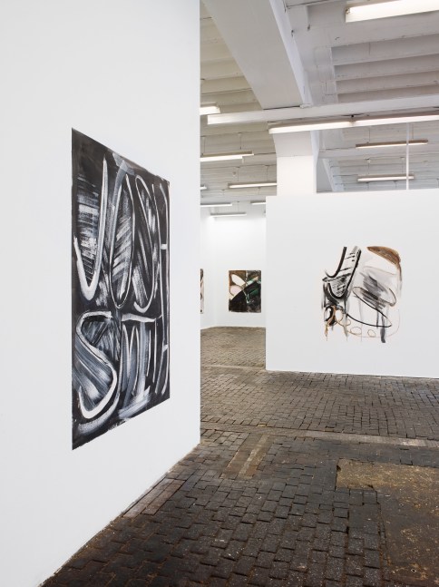 Installation view of paintings by Josh Smith
