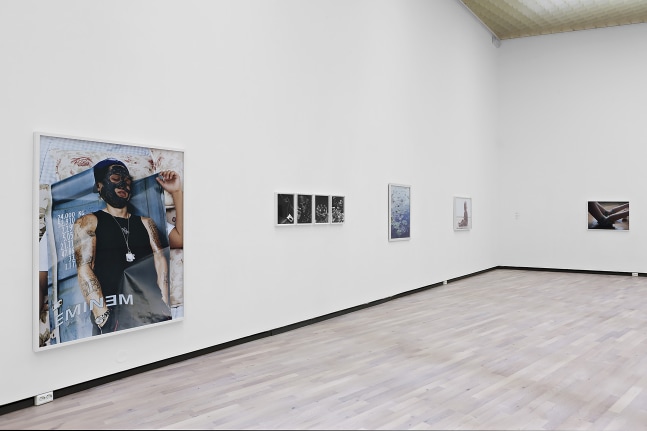 Installation view of photographs by Torbjørn Rødland