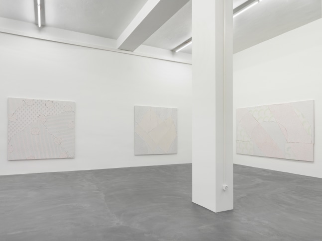 Installation view of Wyatt Kahn wall reliefs