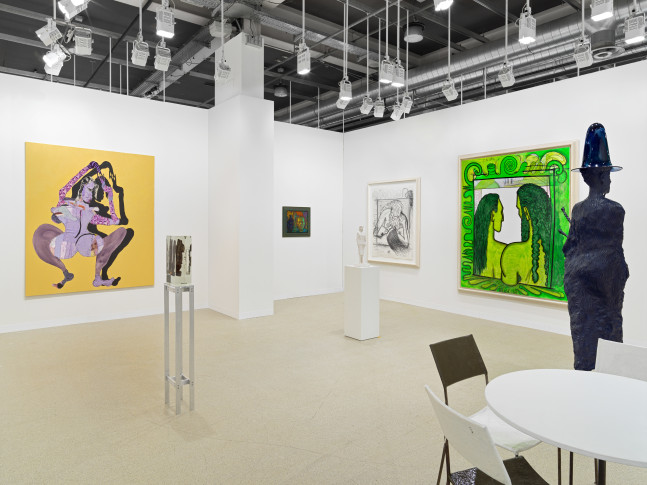 installation view of works by various artists at the Art Basel booth