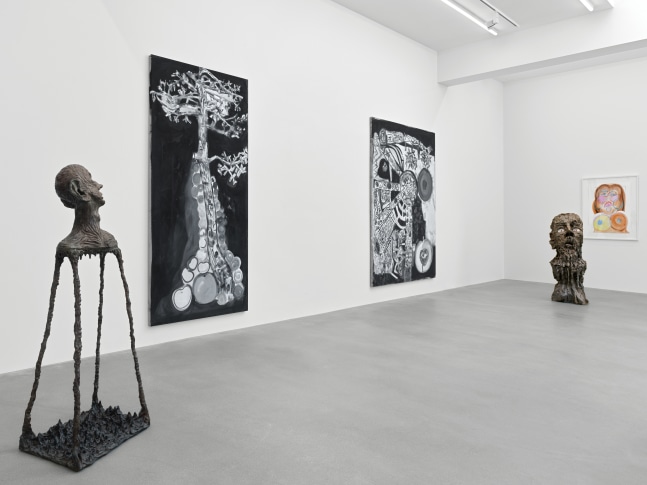 Installation view of group painting, print, and sculpture exhibition