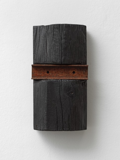 black wooden wall object by Oscar Tuazon