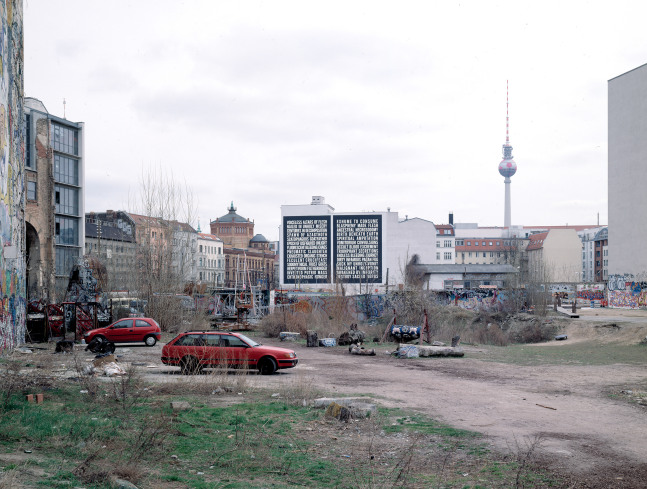 Installation view of outside wall work by Steven Shearer