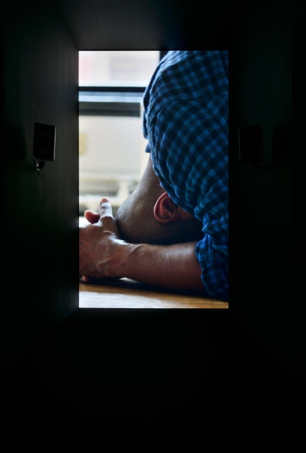 Installation view of video work by Adam Pendleton