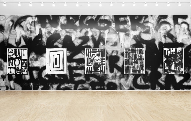 Installation view of Liam Gillick and Adam Pendleton films and wall-based works