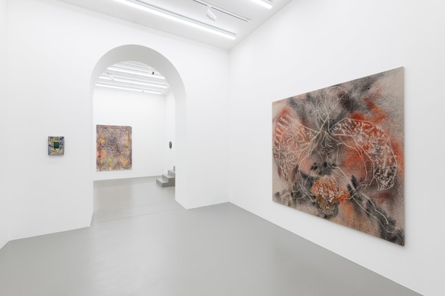 installation views of paintings and ceramic works by Sam Falls