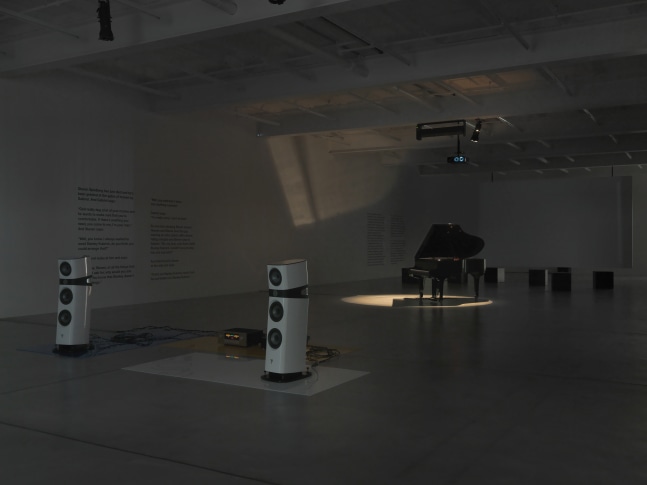 Installation view of Liam Gillick audio and film installation exhibition