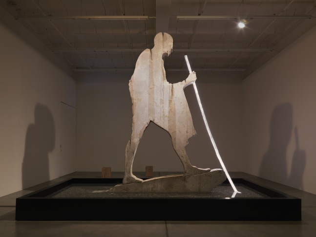 Sculptural installation by Doug Aitken, Crossing the Border 2018 Choreographed light sculpture and synchronized water fountain, steel, wood, fiberglass, stone, concrete 3.71 x 3.39 x 4.57 m / 12.17 x 11.12 x 14.99 feet