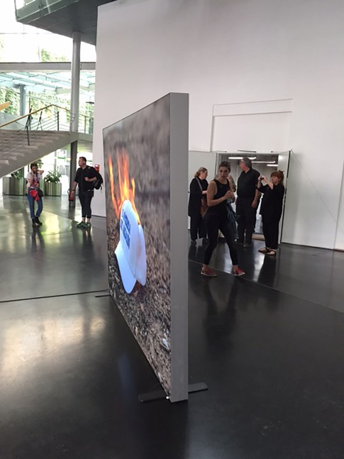 Installation view of video work by Torbjørn Rødland