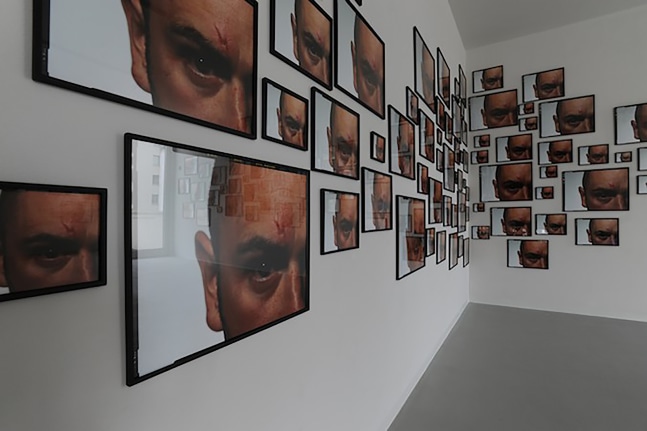 Installation view of photograph by Douglas Gordon