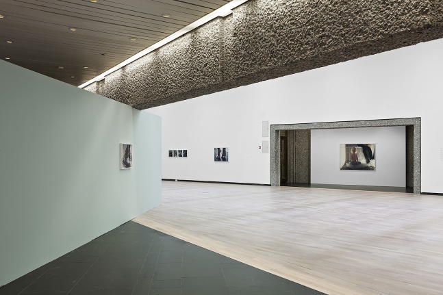 Installation view of photographs by Torbjørn Rødland
