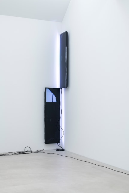 Installation view of a wall work by Walead Beshty