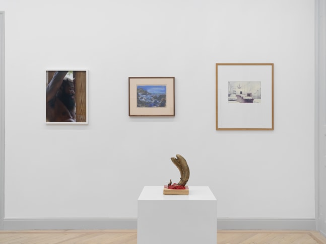 Installation view of group painting, photography, and sculpture exhibition