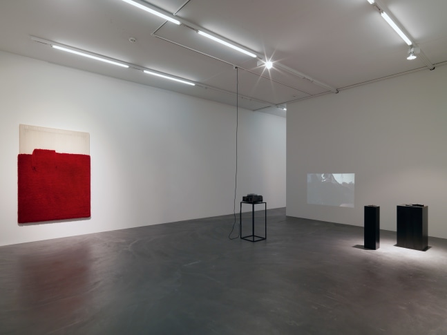 Installation view of paintings, video works and wall works by Latifa Echakhch