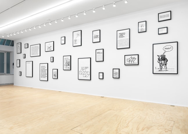 Installation view of Liam Gillick and Adam Pendleton films and wall-based works