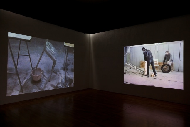 Installation view of video works by Peter Fischli and David Weiss