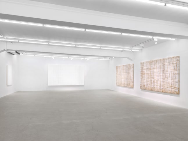 Installation view of Tim Rollins and K.O.S. paintings and text works exhibition